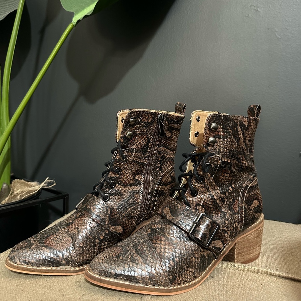 Snake print lace up boots